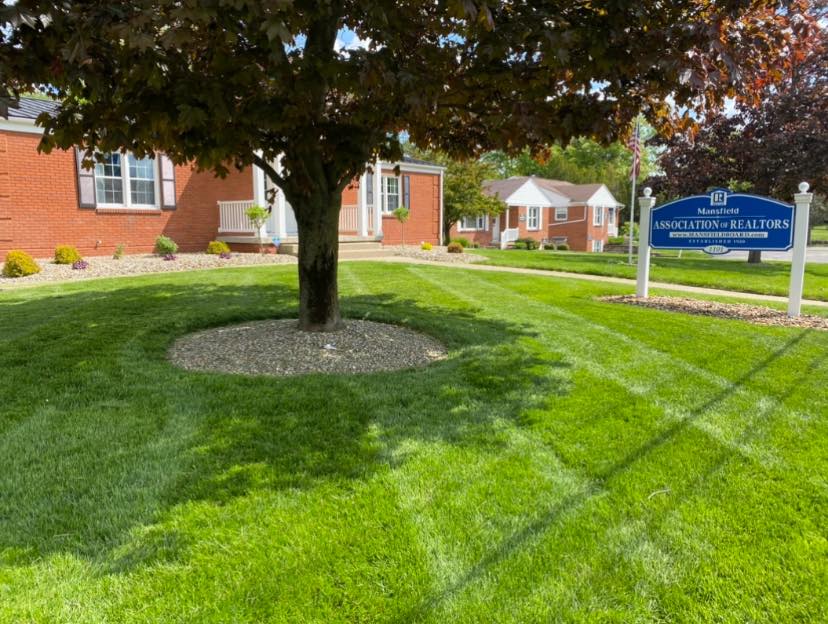 Freshly striped commercial property lawn
